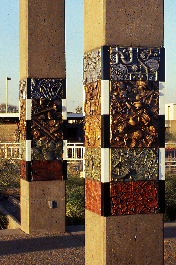 Photograph of two Layers of Time columns showcasing the cast concrete tiles