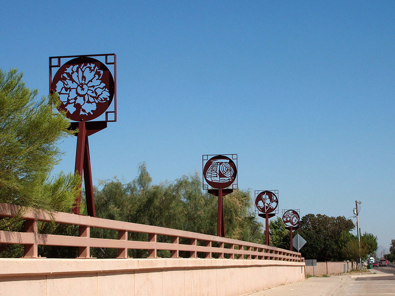 Photograph of Passing Images installed on the bridge in downtown Queen Creek, Arizona